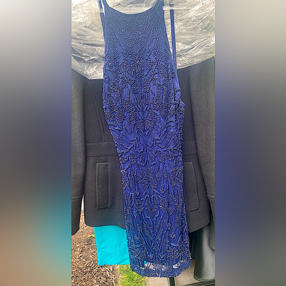 Beautiful beaded navy short dress. Worn once, in perfect condition.